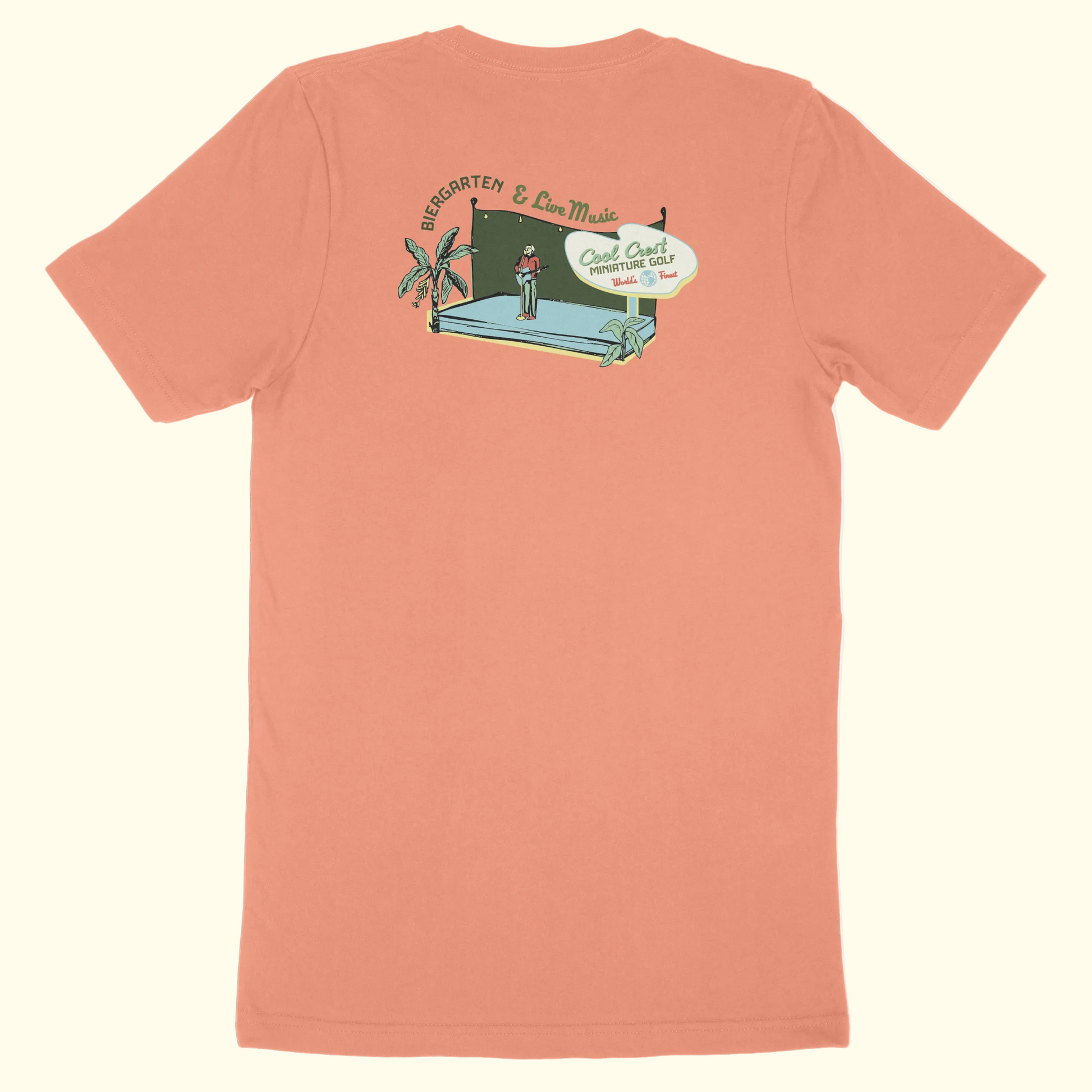 Peach-colored t-shirt with a graphic design on the back against a white background