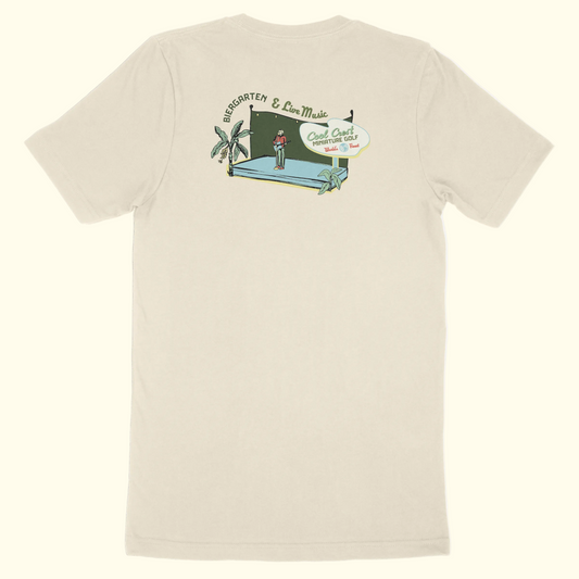 Beige t-shirt with a graphic design on the back against a white background