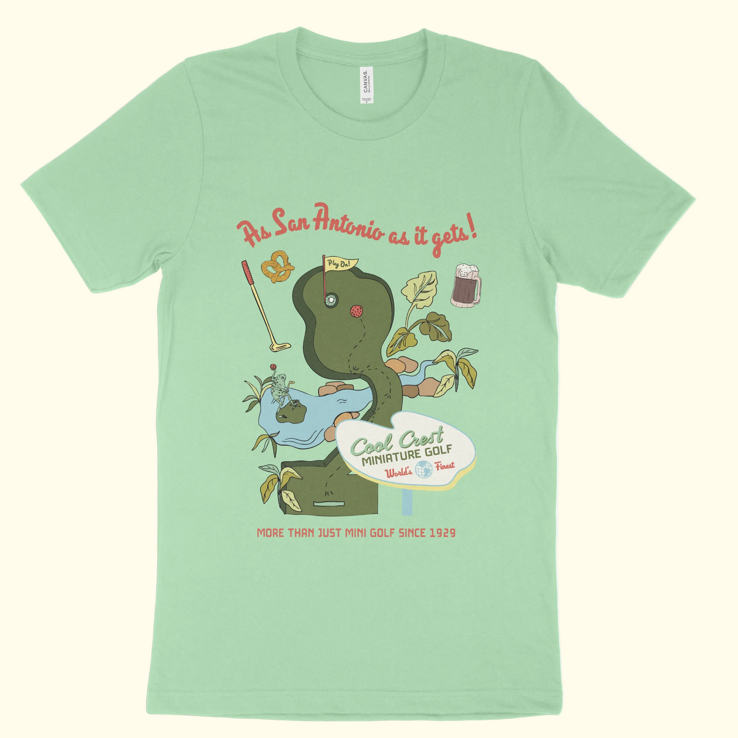 Light green t-shirt with a snake graphic and text on a white background